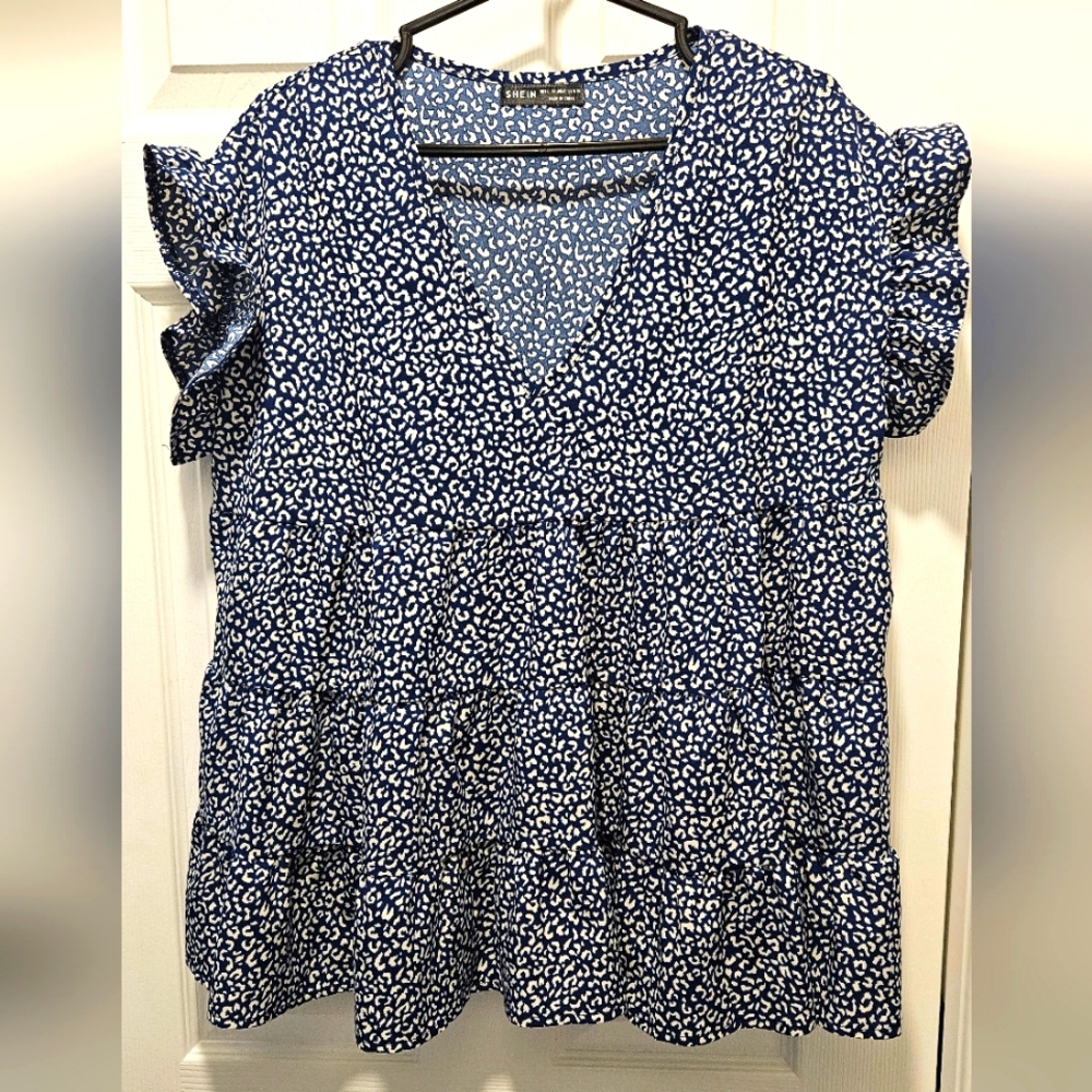 40. Navy/White Cheetah Print Peplum Top Size Large